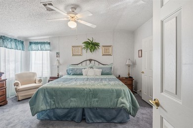 Check out this beautiful, 55+ community that is full of trees on Rivard Golf and Country Club in Florida - for sale on GolfHomes.com, golf home, golf lot