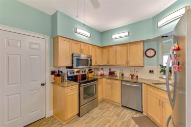 Absolutely Stunning Ground Floor Unit overlooking the Tara Golf on Tara Golf and Country Club in Florida - for sale on GolfHomes.com, golf home, golf lot