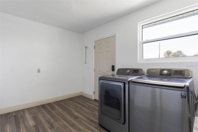 RELAX BY THE RIVER IN THIS MOVE-IN READY RETREAT ON REEF ROAD! on Daytona Beach Golf Club in Florida - for sale on GolfHomes.com, golf home, golf lot