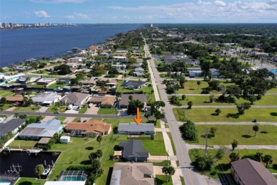 RELAX BY THE RIVER IN THIS MOVE-IN READY RETREAT ON REEF ROAD! on Daytona Beach Golf Club in Florida - for sale on GolfHomes.com, golf home, golf lot
