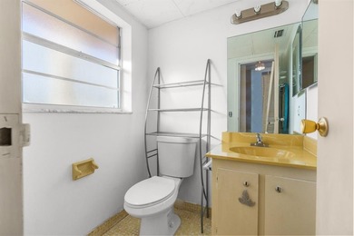 HANDYMAN SPECIAL! This 1-bedroom, 1.5-bath unit offers beautiful on Oriole Golf and Tennis Club in Florida - for sale on GolfHomes.com, golf home, golf lot