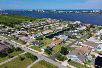 RELAX BY THE RIVER IN THIS MOVE-IN READY RETREAT ON REEF ROAD! on Daytona Beach Golf Club in Florida - for sale on GolfHomes.com, golf home, golf lot