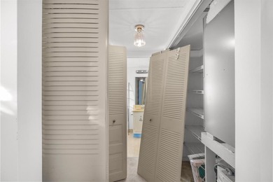 HANDYMAN SPECIAL! This 1-bedroom, 1.5-bath unit offers beautiful on Oriole Golf and Tennis Club in Florida - for sale on GolfHomes.com, golf home, golf lot