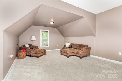 Step into this stunning 4-brf, 2.5-bath brick-front home on Northstone Country Club in North Carolina - for sale on GolfHomes.com, golf home, golf lot