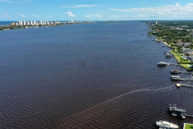 RELAX BY THE RIVER IN THIS MOVE-IN READY RETREAT ON REEF ROAD! on Daytona Beach Golf Club in Florida - for sale on GolfHomes.com, golf home, golf lot