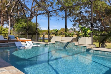 This former Cornerstone model home is situated on a private lot on The Palencia Club in Florida - for sale on GolfHomes.com, golf home, golf lot