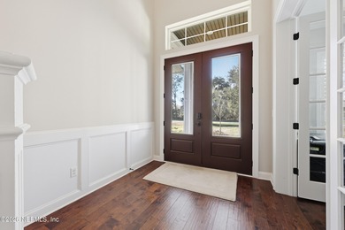 This former Cornerstone model home is situated on a private lot on The Palencia Club in Florida - for sale on GolfHomes.com, golf home, golf lot