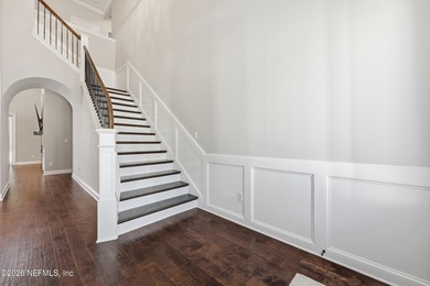 This former Cornerstone model home is situated on a private lot on The Palencia Club in Florida - for sale on GolfHomes.com, golf home, golf lot