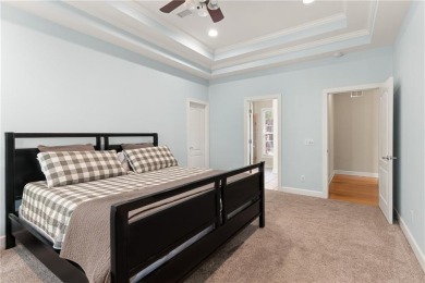 Discover this stunning traditional-style home located in the on Oak Grove Island Golf and Country Club in Georgia - for sale on GolfHomes.com, golf home, golf lot