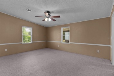 Welcome to Orange Blossom Gardens! This beautiful move in ready on Orange Blossom Hills Golf and Country Club in Florida - for sale on GolfHomes.com, golf home, golf lot