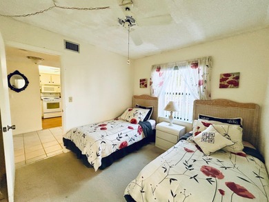 Don't miss out on this 1st floor corner condo. Parking right out on Forest Oaks Golf Club in Florida - for sale on GolfHomes.com, golf home, golf lot