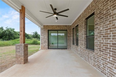Welcome to 22202 Field Street - A Distinguished Retreat in White on White Bluff Resort - New Course in Texas - for sale on GolfHomes.com, golf home, golf lot
