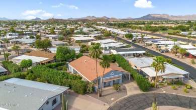 Turn-key home in guard-gated Fountain of the Sun! Situated on an on Fountain of the Sun Country Club in Arizona - for sale on GolfHomes.com, golf home, golf lot
