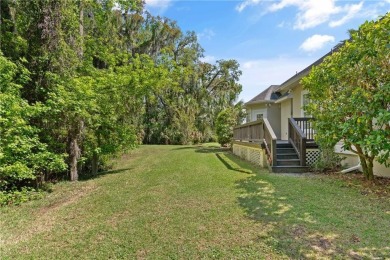 Discover this stunning traditional-style home located in the on Oak Grove Island Golf and Country Club in Georgia - for sale on GolfHomes.com, golf home, golf lot