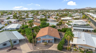 Turn-key home in guard-gated Fountain of the Sun! Situated on an on Fountain of the Sun Country Club in Arizona - for sale on GolfHomes.com, golf home, golf lot