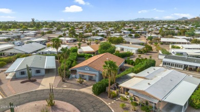 Turn-key home in guard-gated Fountain of the Sun! Situated on an on Fountain of the Sun Country Club in Arizona - for sale on GolfHomes.com, golf home, golf lot