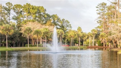 Discover this stunning traditional-style home located in the on Oak Grove Island Golf and Country Club in Georgia - for sale on GolfHomes.com, golf home, golf lot