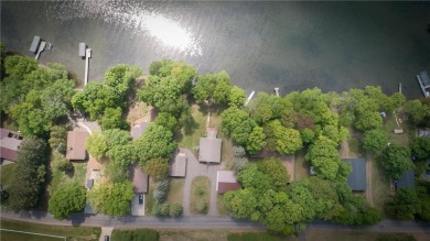 Fantastic year round home on one of MN largest lakes! Nestled on on Hardwoods Golf Club At Mille Lacs in Minnesota - for sale on GolfHomes.com, golf home, golf lot