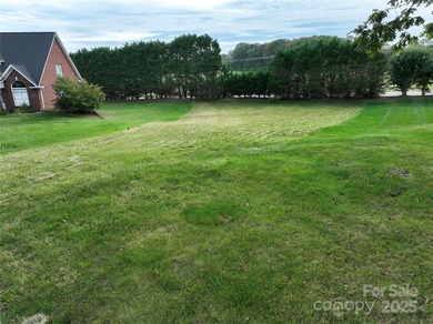 Large, cleared, gently sloping lot in prestigious Rock Barn on Rock Barn Golf and Spa in North Carolina - for sale on GolfHomes.com, golf home, golf lot
