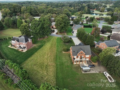Large, cleared, gently sloping lot in prestigious Rock Barn on Rock Barn Golf and Spa in North Carolina - for sale on GolfHomes.com, golf home, golf lot
