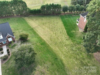 Large, cleared, gently sloping lot in prestigious Rock Barn on Rock Barn Golf and Spa in North Carolina - for sale on GolfHomes.com, golf home, golf lot