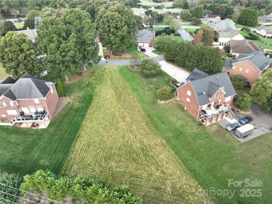 Large, cleared, gently sloping lot in prestigious Rock Barn on Rock Barn Golf and Spa in North Carolina - for sale on GolfHomes.com, golf home, golf lot
