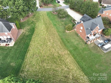 Large, cleared, gently sloping lot in prestigious Rock Barn on Rock Barn Golf and Spa in North Carolina - for sale on GolfHomes.com, golf home, golf lot