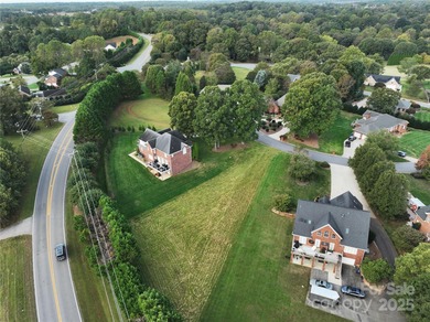 Large, cleared, gently sloping lot in prestigious Rock Barn on Rock Barn Golf and Spa in North Carolina - for sale on GolfHomes.com, golf home, golf lot
