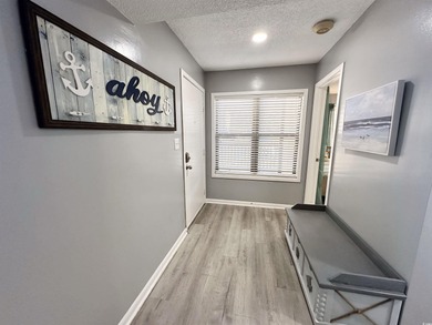 Welcome to coastal living at its best in this 2-bedroom, 2-bath on The Dunes Golf and Beach Club in South Carolina - for sale on GolfHomes.com, golf home, golf lot