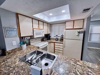 Welcome to coastal living at its best in this 2-bedroom, 2-bath on The Dunes Golf and Beach Club in South Carolina - for sale on GolfHomes.com, golf home, golf lot