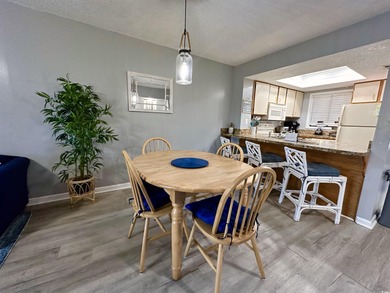 Welcome to coastal living at its best in this 2-bedroom, 2-bath on The Dunes Golf and Beach Club in South Carolina - for sale on GolfHomes.com, golf home, golf lot