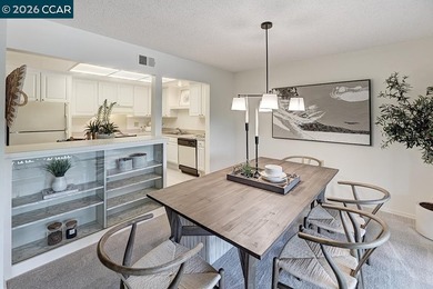 This home offers a peaceful retreat with abundant light and a on Rossmoor Golf Course in California - for sale on GolfHomes.com, golf home, golf lot