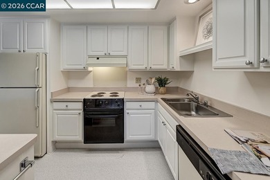 This home offers a peaceful retreat with abundant light and a on Rossmoor Golf Course in California - for sale on GolfHomes.com, golf home, golf lot