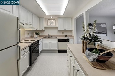 This home offers a peaceful retreat with abundant light and a on Rossmoor Golf Course in California - for sale on GolfHomes.com, golf home, golf lot