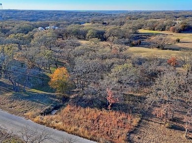 Experience the peaceful lifestyle of Nocona Hills with this on Nocona Hills Golf Course in Texas - for sale on GolfHomes.com, golf home, golf lot