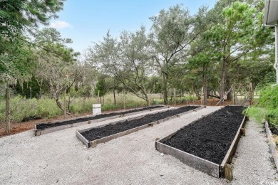 Welcome to 5811 Timber Race Course, a rare two-dwelling on The Links at Stono Ferry in South Carolina - for sale on GolfHomes.com, golf home, golf lot
