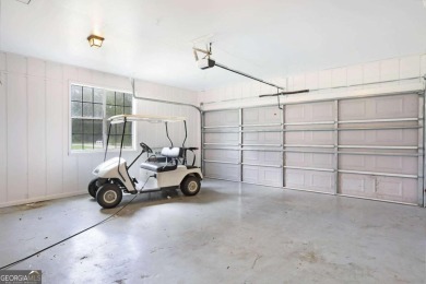 Welcome to this 3-bedroom, 3-bathroom home situated on a on Pine Forest Country Club in Georgia - for sale on GolfHomes.com, golf home, golf lot