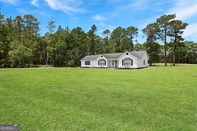 Welcome to this 3-bedroom, 3-bathroom home situated on a on Pine Forest Country Club in Georgia - for sale on GolfHomes.com, golf home, golf lot