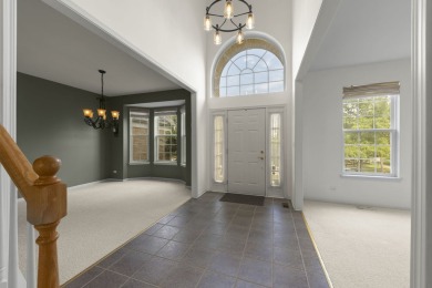 Nestled on one of the most coveted lots in Sterling Oaks, this on Streamwood Oaks Golf Club in Illinois - for sale on GolfHomes.com, golf home, golf lot