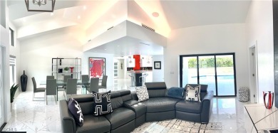 Modern Elegance Meets Florida Living in Imperial Golf Estates! on Imperial Golf Club in Florida - for sale on GolfHomes.com, golf home, golf lot