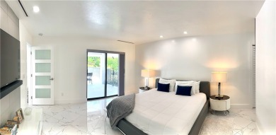 Modern Elegance Meets Florida Living in Imperial Golf Estates! on Imperial Golf Club in Florida - for sale on GolfHomes.com, golf home, golf lot