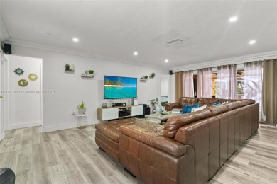 Welcome to your waterfront oasis in Sunrise Golf Village! This on Sunrise Lakes Phase III in Florida - for sale on GolfHomes.com, golf home, golf lot