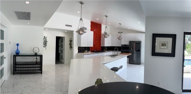 Modern Elegance Meets Florida Living in Imperial Golf Estates! on Imperial Golf Club in Florida - for sale on GolfHomes.com, golf home, golf lot