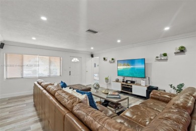 Welcome to your waterfront oasis in Sunrise Golf Village! This on Sunrise Lakes Phase III in Florida - for sale on GolfHomes.com, golf home, golf lot