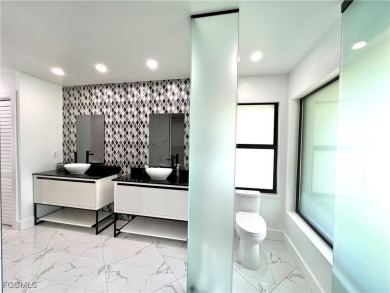 Modern Elegance Meets Florida Living in Imperial Golf Estates! on Imperial Golf Club in Florida - for sale on GolfHomes.com, golf home, golf lot