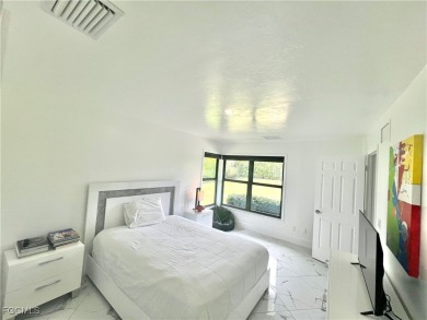 Modern Elegance Meets Florida Living in Imperial Golf Estates! on Imperial Golf Club in Florida - for sale on GolfHomes.com, golf home, golf lot