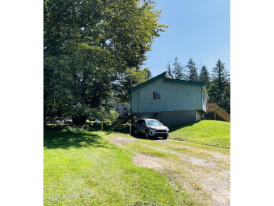 Opportunity knocks with this perfect fixer upper full of on The Hideout Golf in Pennsylvania - for sale on GolfHomes.com, golf home, golf lot