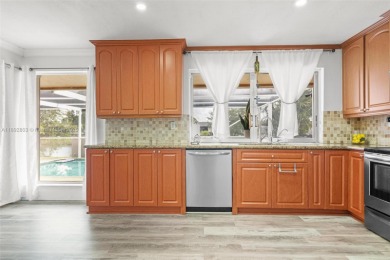 Welcome to your waterfront oasis in Sunrise Golf Village! This on Sunrise Lakes Phase III in Florida - for sale on GolfHomes.com, golf home, golf lot