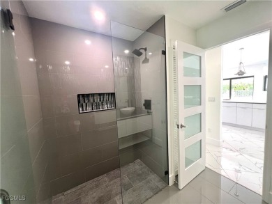 Modern Elegance Meets Florida Living in Imperial Golf Estates! on Imperial Golf Club in Florida - for sale on GolfHomes.com, golf home, golf lot
