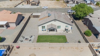 This charming ranch-style 3 bedroom home in the rapidly growing on The Links At Coyote Wash in Arizona - for sale on GolfHomes.com, golf home, golf lot